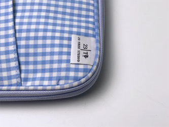 23 Tree Studio label on the Juliette Watercolor Clutch in blue gingham