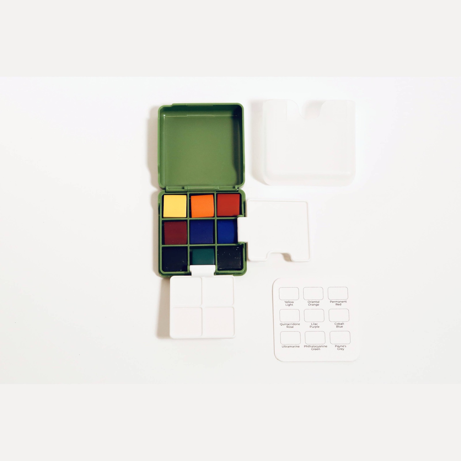 Kaden 9-color travel watercolor palette — open with water container