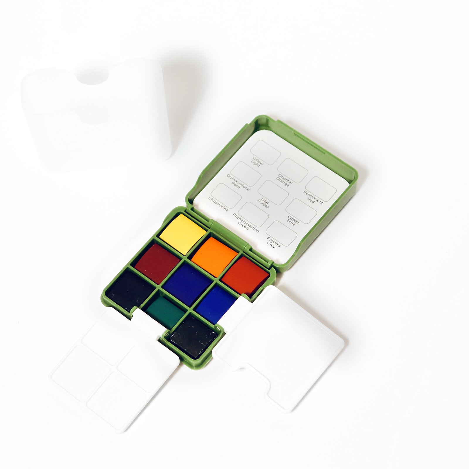 Kaden 9-color travel watercolor palette fully open with swatch card and mixing trays